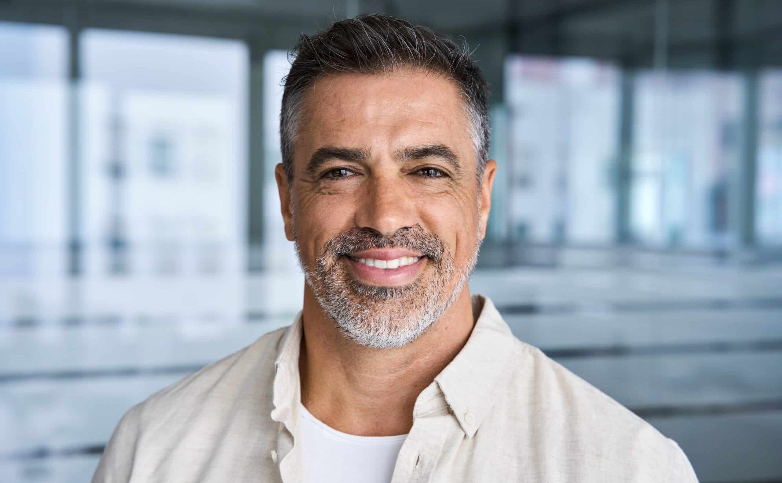 Headshot,Close,Up,Portrait,Of,Indian,Or,Latin,Confident,Mature